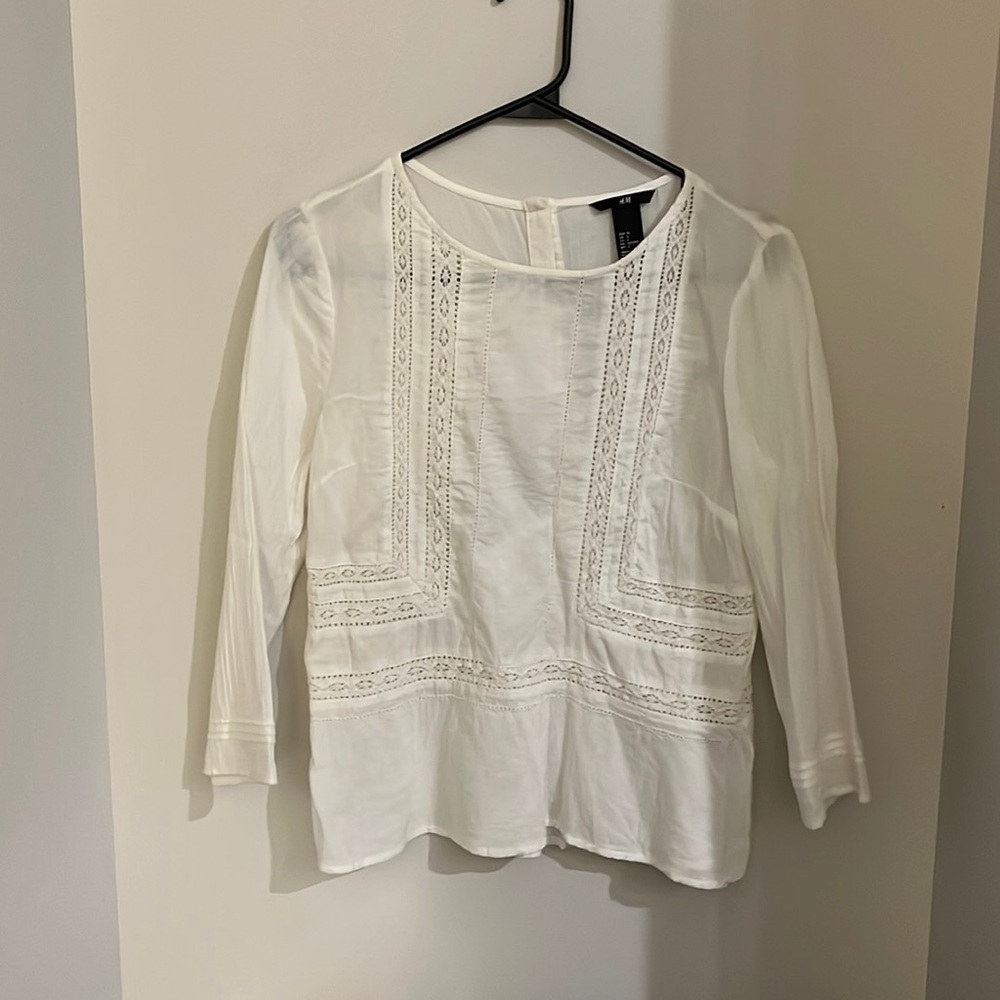 White blouse with lace pattern
